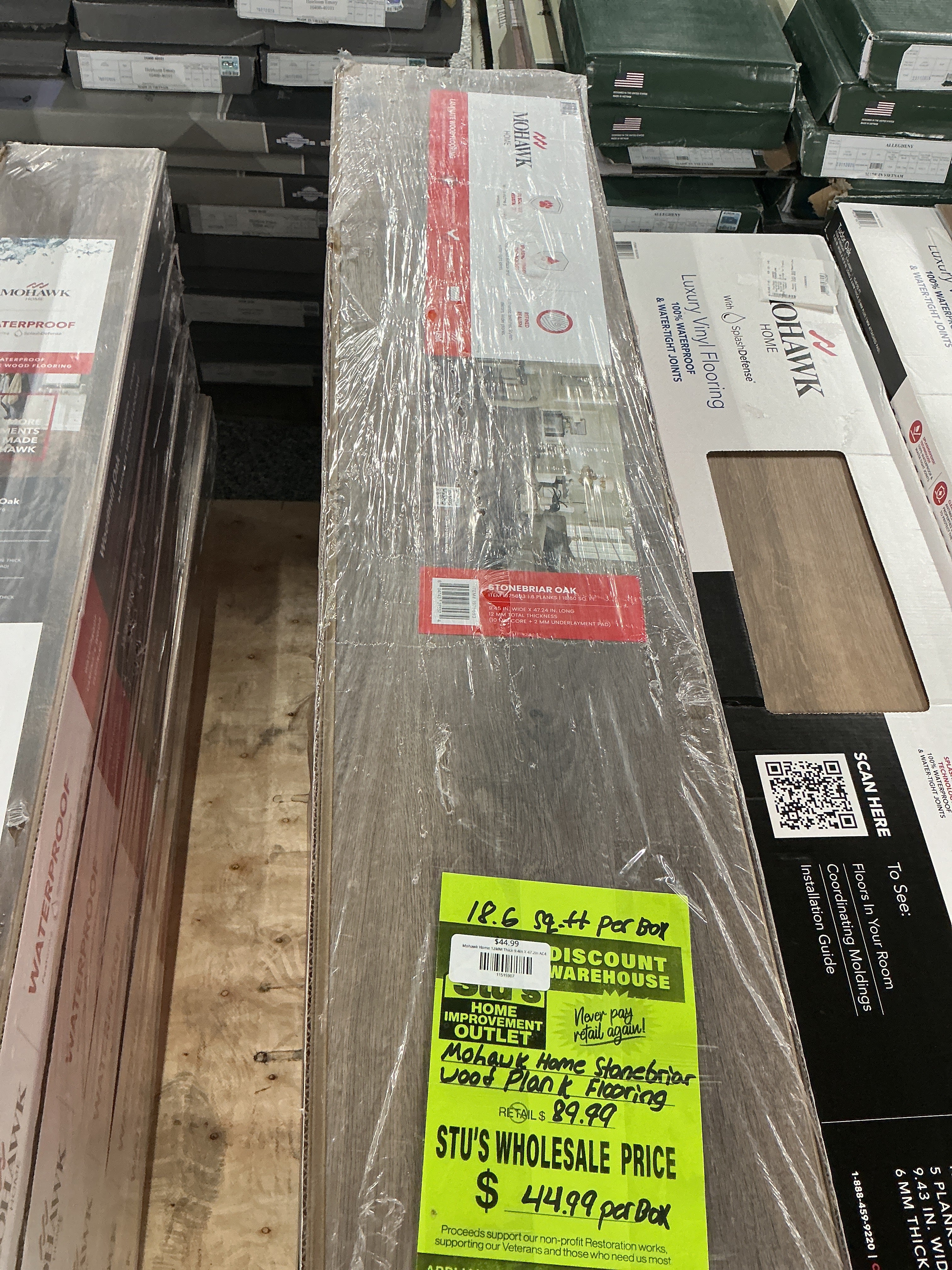 Mohawk Home Woodmill Oak Waterproof Laminate 12mm Thick Plank With 2mm Attached Pad Included 18.14 sq.ft
