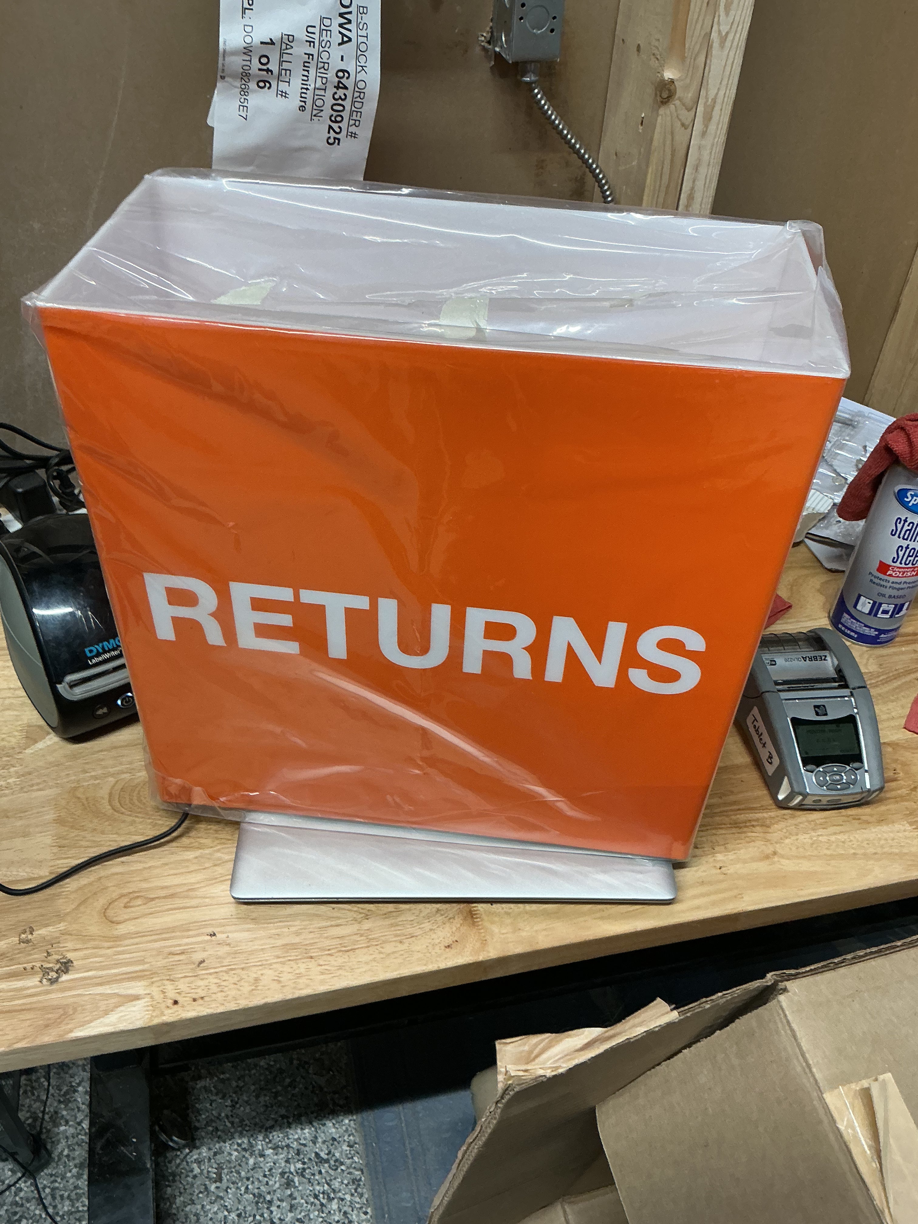 Orange Returns Sign