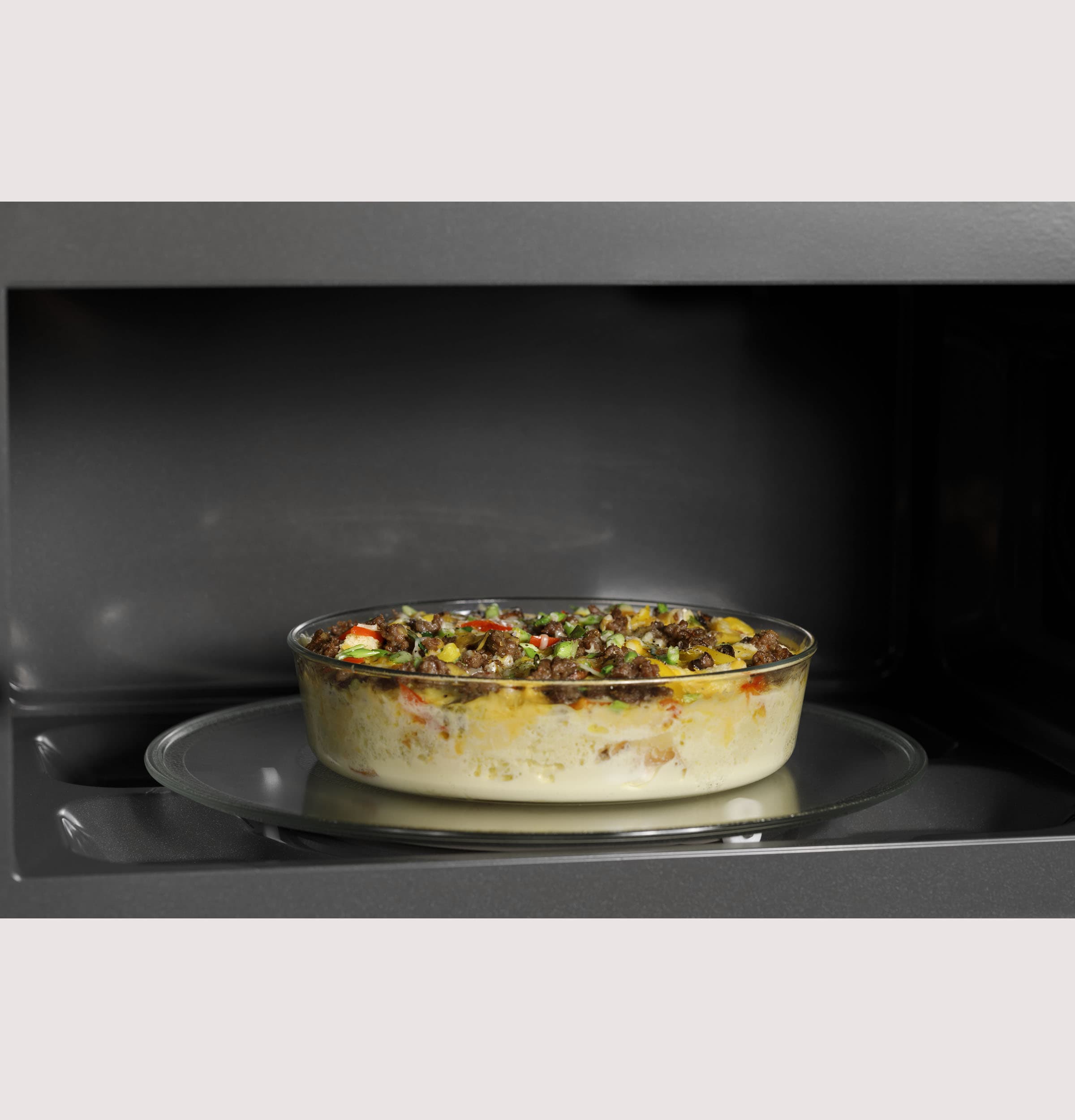GE Profile 2.1-cu ft Over-the-Range Microwave with Sensor Cooking ( Stainless steel )