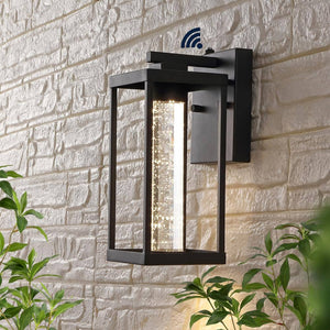 Juno 4.75 in. Black Hardwired Outdoor Cylinder Sconce Iron/Seeded Glass with Dusk - to - Dawn Sensor Integrated LED 1 - Light - Stu's Home Improvement Outlet