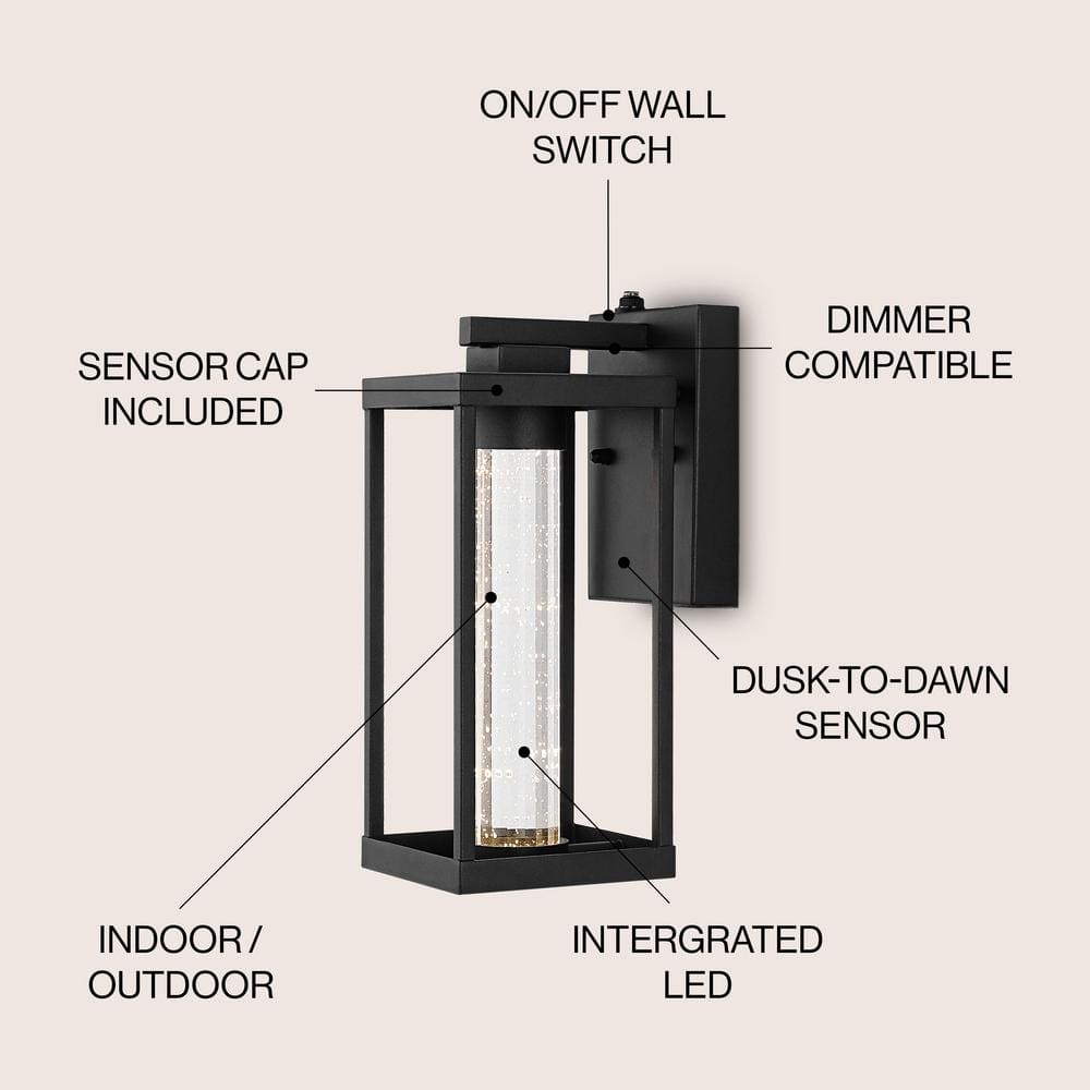 Juno 4.75 in. Black Hardwired Outdoor Cylinder Sconce Iron/Seeded Glass with Dusk - to - Dawn Sensor Integrated LED 1 - Light - Stu's Home Improvement Outlet