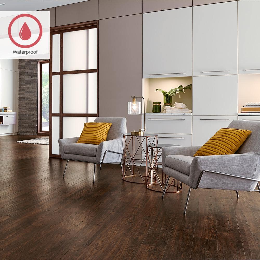 Outlast+ Java Scraped Oak 12 mm T x 6.1 in. W Waterproof Laminate Wood Flooring (16.1 sqft/case)