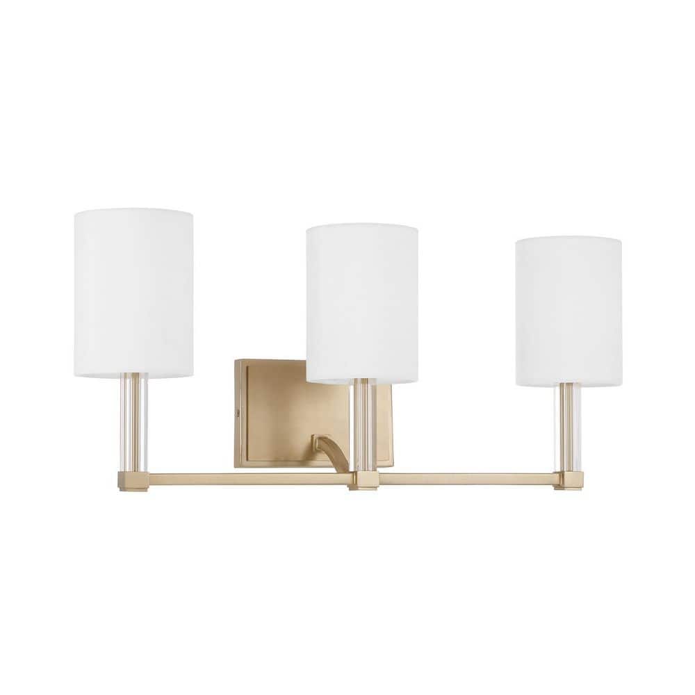 Ingrid 24 in. W x 9.75 in. H 3 - Light Matte Brass Vanity Light with Clear Acrylic Accents and White Fabric Shades - Stu's Home Improvement Outlet